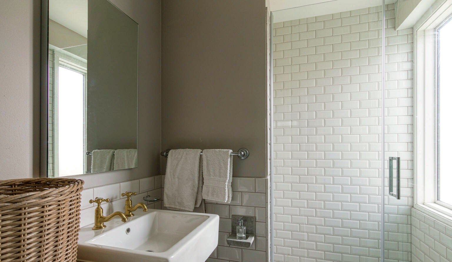 Home Second bathroom with grey walls and brass taps